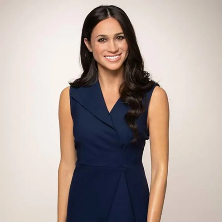 meghan markle smiling waxwork on white background