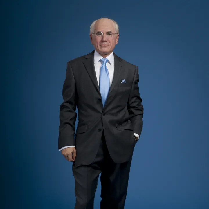 john howard wax work in blue tie