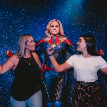 Captain Marvel With Two Guests